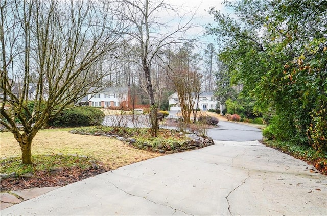 970 Winding Creek Trl, Sandy Springs, GA 30328 - view of concrete surface featuring a residential view