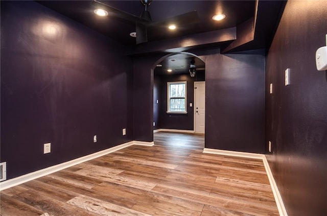 970 Winding Creek Trl, Sandy Springs, GA 30328 - spare room featuring arched walkways, wood finished floors, and recessed lighting