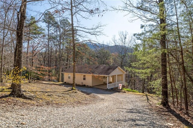 1700 Greenfield Rd, Ellijay, GA 30536 - view of front of property with gravel driveway and a view of trees