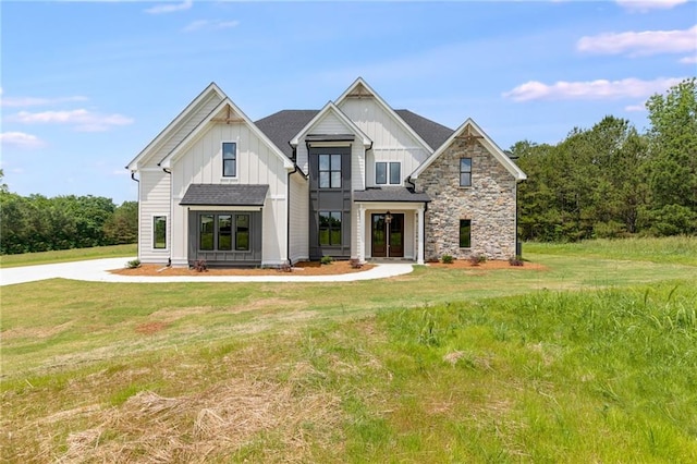 800 Lake Circle Rd, Buchanan, GA 30113 - view of front of property with board and batten siding, a front lawn, and stone siding