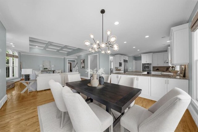 745 Glengate Pl, Atlanta, GA 30328 - dining area featuring recessed lighting, a chandelier, coffered ceiling, light wood-style flooring, and beamed ceiling