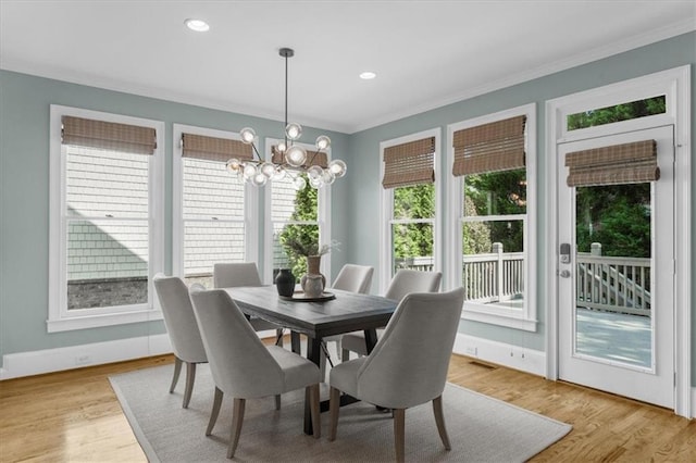 745 Glengate Pl, Atlanta, GA 30328 - dining room with a chandelier, ornamental molding, light wood-style flooring, and recessed lighting