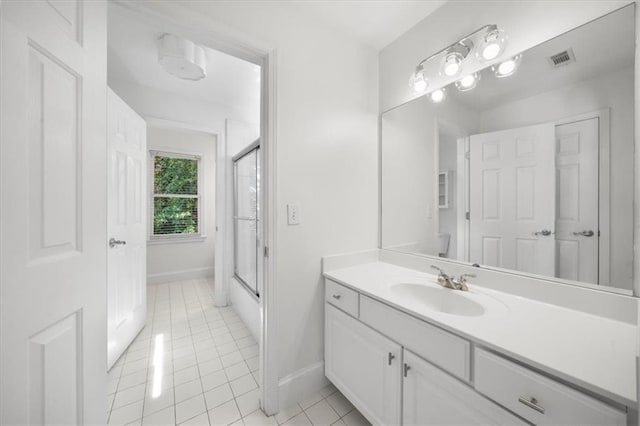 745 Glengate Pl, Atlanta, GA 30328 - bathroom featuring a shower with door, tile patterned floors, and vanity