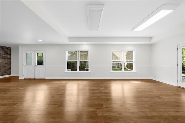 745 Glengate Pl, Atlanta, GA 30328 - unfurnished living room with wood finished floors and recessed lighting