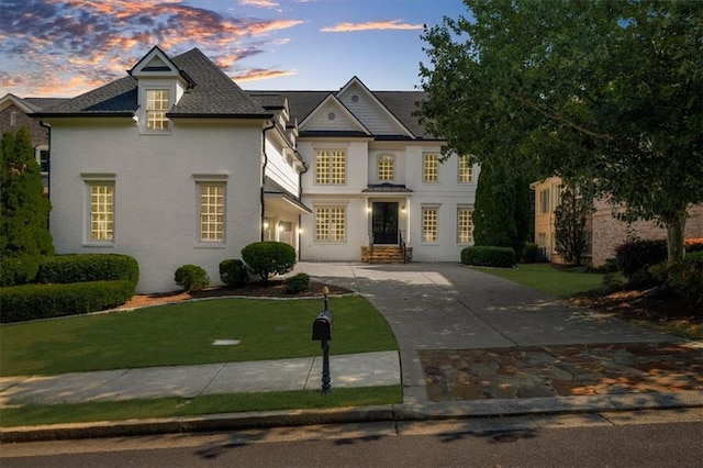 745 Glengate Pl, Atlanta, GA 30328 - french country inspired facade featuring a yard and driveway