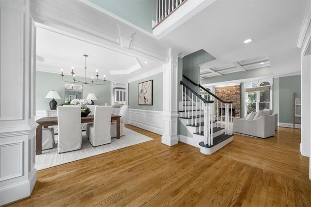 745 Glengate Pl, Atlanta, GA 30328 - dining area featuring ornamental molding, wood finished floors, stairs, a chandelier, and recessed lighting