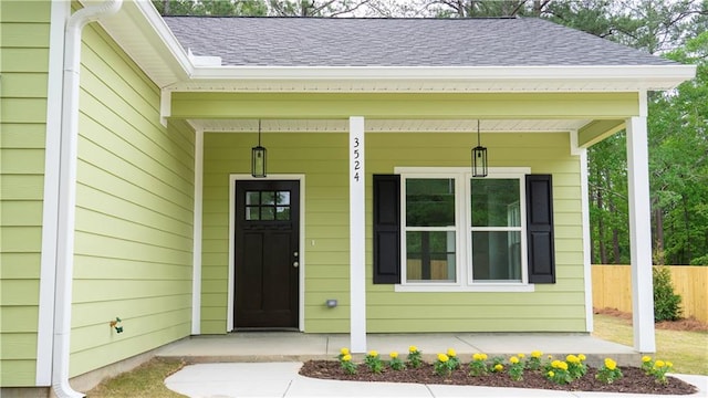 property entrance featuring a porch