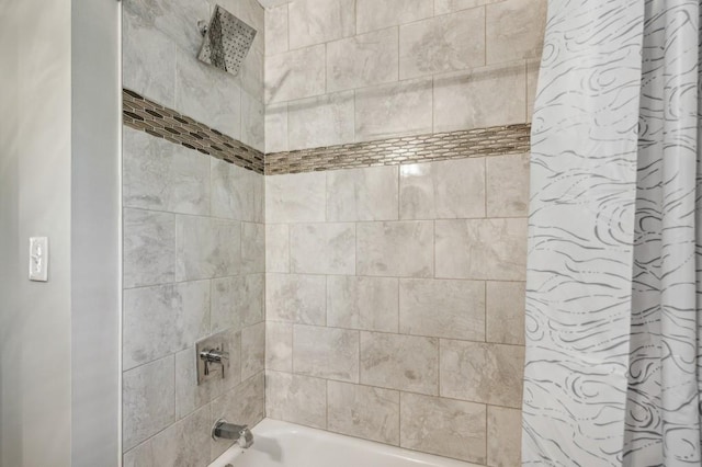 bathroom featuring shower / bath combo with shower curtain