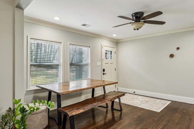 dining room with ornamental molding, dark hardwood / wood-style floors, and ceiling fan