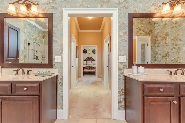 bathroom featuring a sink, wallpapered walls, and crown molding