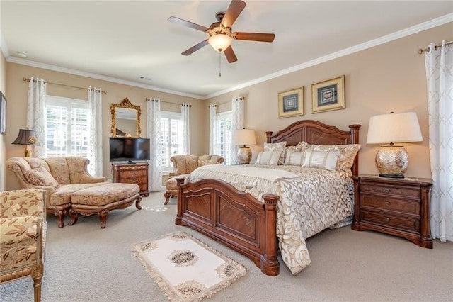 bedroom featuring light carpet, ceiling fan, and crown molding