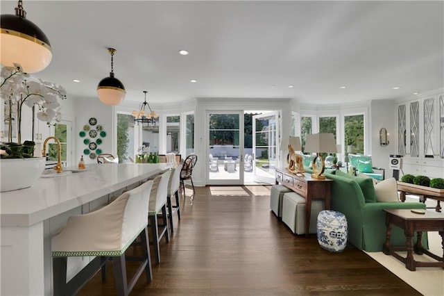 interior space featuring dark hardwood / wood-style flooring and a chandelier