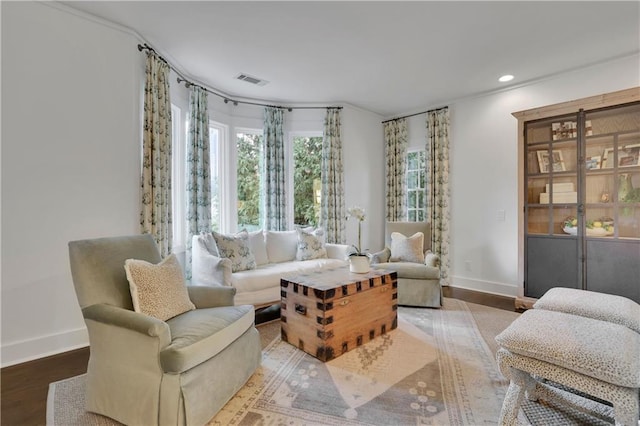 sitting room featuring hardwood / wood-style floors