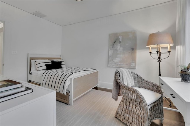 bedroom featuring light hardwood / wood-style flooring