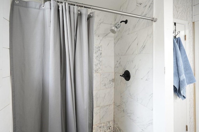 bathroom featuring a shower stall