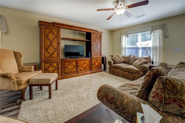 110 Baltusrol Way, Covington, GA 30014 - living area featuring a ceiling fan and wood finished floors