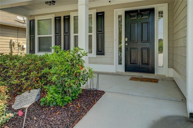 110 Baltusrol Way, Covington, GA 30014 - doorway to property featuring covered porch