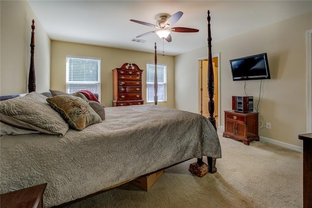 110 Baltusrol Way, Covington, GA 30014 - bedroom featuring light colored carpet, baseboards, and a ceiling fan