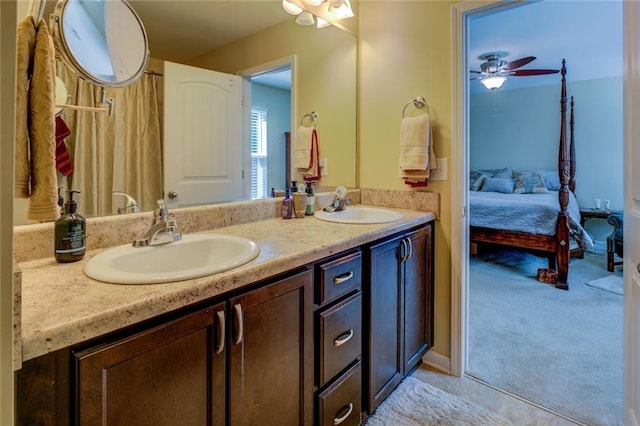 110 Baltusrol Way, Covington, GA 30014 - bathroom featuring double vanity, ensuite bathroom, and a ceiling fan