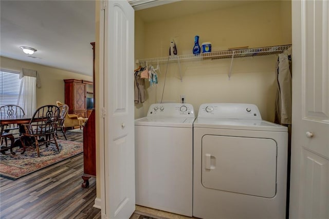 110 Baltusrol Way, Covington, GA 30014 - washroom featuring washing machine and dryer and wood finished floors