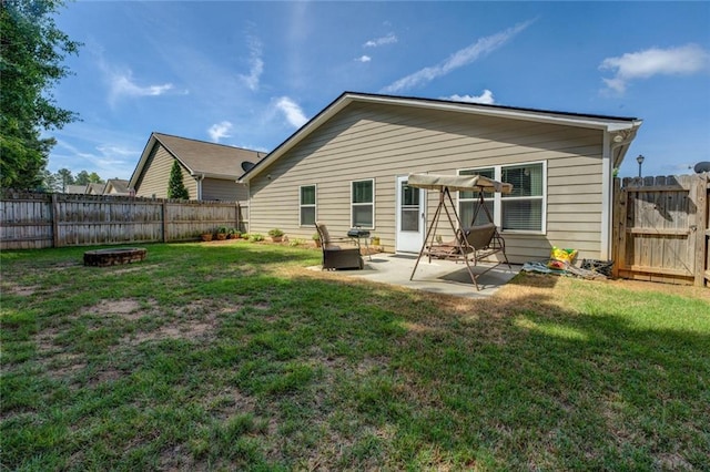 110 Baltusrol Way, Covington, GA 30014 - rear view of property featuring a patio area and a gate