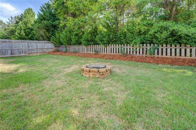 110 Baltusrol Way, Covington, GA 30014 - view of yard featuring an outdoor fire pit
