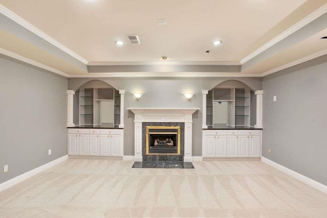 unfurnished living room featuring light colored carpet, a raised ceiling, and ornamental molding