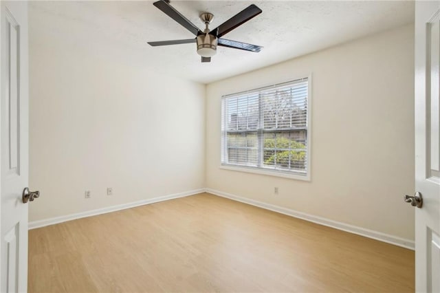 5638 River Heights Xing SE, Marietta, GA 30067 - unfurnished room featuring light wood-style floors, baseboards, and ceiling fan