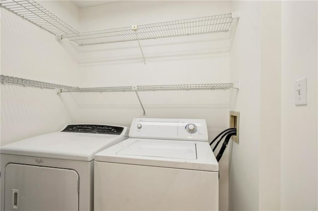 5638 River Heights Xing SE, Marietta, GA 30067 - clothes washing area featuring laundry area and washing machine and dryer
