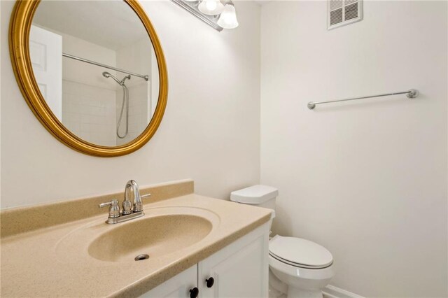 5638 River Heights Xing SE, Marietta, GA 30067 - bathroom featuring vanity, visible vents, and toilet
