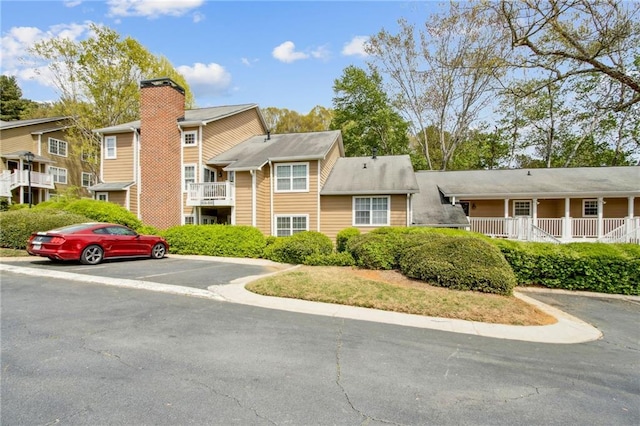 5638 River Heights Xing SE, Marietta, GA 30067 - view of building exterior featuring uncovered parking