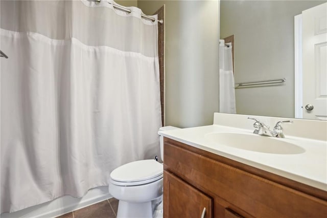 11259 Calypso Dr, Alpharetta, GA 30009 - full bath featuring tile patterned flooring, vanity, toilet, and shower / tub combo