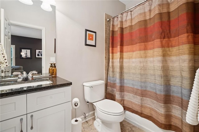 11259 Calypso Dr, Alpharetta, GA 30009 - full bath featuring vanity, toilet, tile patterned flooring, shower / bath combination with curtain, and baseboards