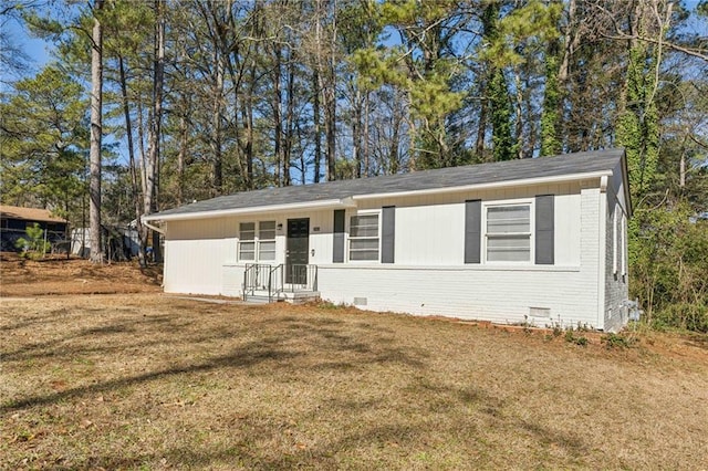 ranch-style home with a front yard