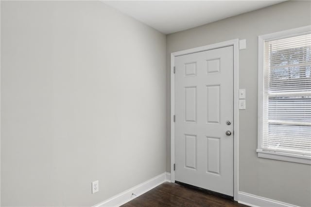 foyer entrance with dark hardwood / wood-style flooring