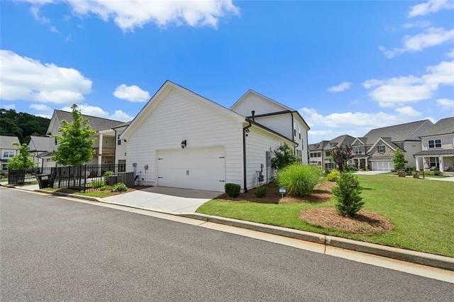 940 Emmett Walk, Alpharetta, GA 30004 - view of home's exterior featuring a residential view, an attached garage, and driveway