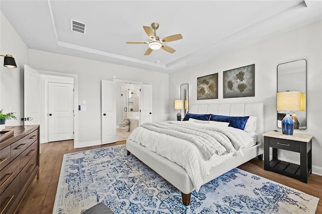 940 Emmett Walk, Alpharetta, GA 30004 - bedroom with a raised ceiling, dark wood finished floors, ensuite bath, and ceiling fan