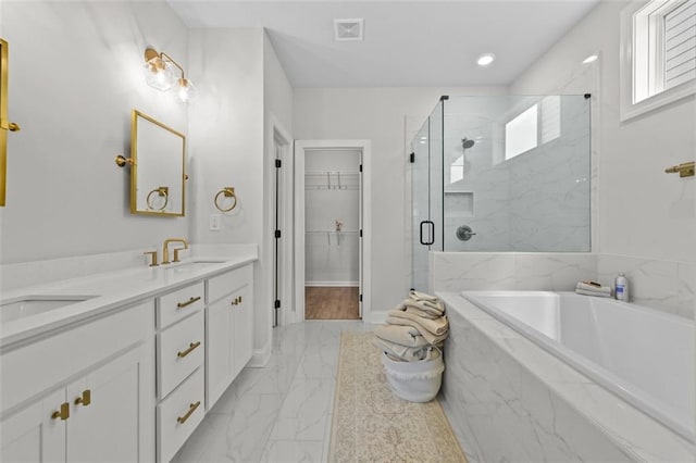 940 Emmett Walk, Alpharetta, GA 30004 - bathroom with a bath, a marble finish shower, marble finish floors, double vanity, and a walk in closet