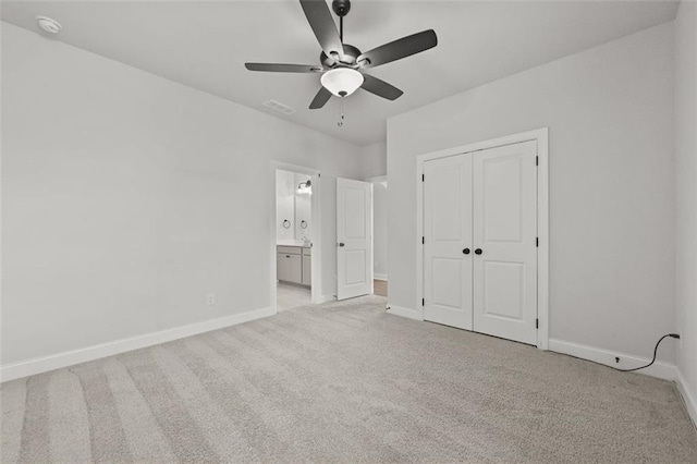940 Emmett Walk, Alpharetta, GA 30004 - unfurnished bedroom with light carpet, a closet, ensuite bath, and a ceiling fan