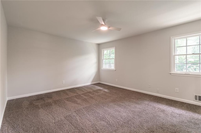 2146 Chevy Chase Ln, Decatur, GA 30032 - empty room featuring ceiling fan, dark colored carpet, and baseboards