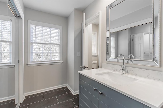 2146 Chevy Chase Ln, Decatur, GA 30032 - bathroom featuring vanity, healthy amount of natural light, and baseboards