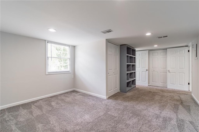 2146 Chevy Chase Ln, Decatur, GA 30032 - unfurnished bedroom with carpet floors, baseboards, recessed lighting, and two closets