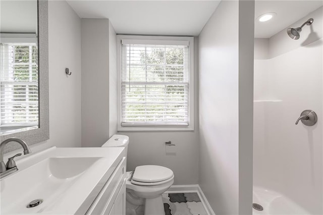 2146 Chevy Chase Ln, Decatur, GA 30032 - full bathroom featuring a stall shower, vanity, toilet, and baseboards