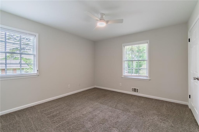 2146 Chevy Chase Ln, Decatur, GA 30032 - spare room with ceiling fan, dark carpet, and baseboards