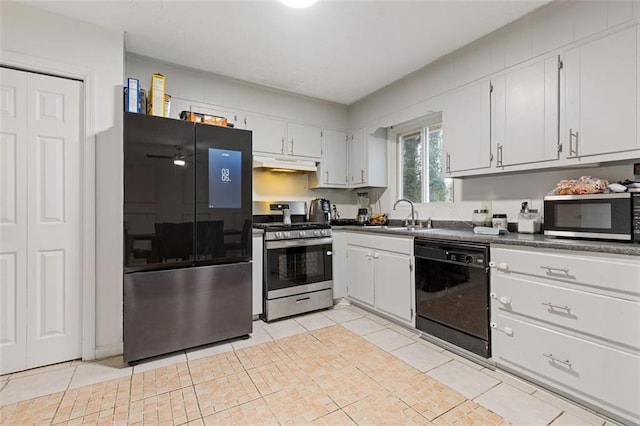 kitchen featuring sink, white cabinetry, light tile patterned floors, and stainless steel appliances