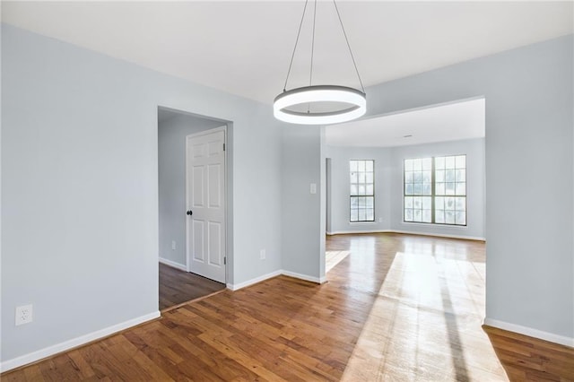 8914 Gardener Dr, Jonesboro, GA 30238 - empty room with wood finished floors and baseboards