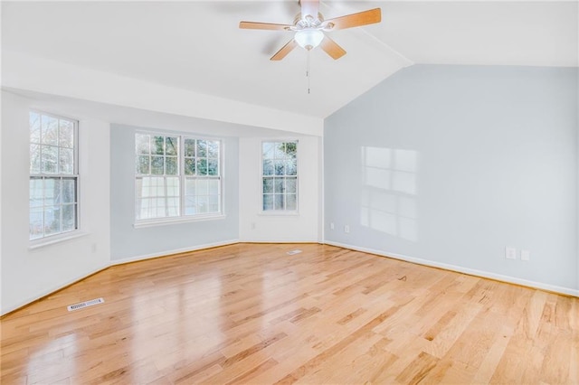 8914 Gardener Dr, Jonesboro, GA 30238 - spare room with lofted ceiling, wood finished floors, a ceiling fan, and baseboards