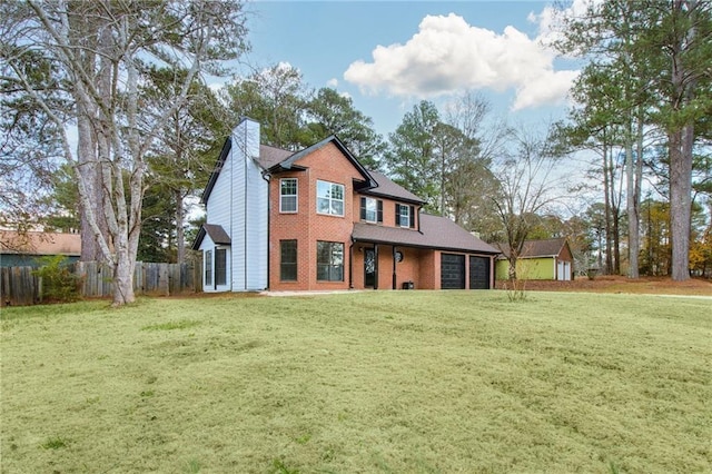 8914 Gardener Dr, Jonesboro, GA 30238 - view of front of home with an attached garage, brick siding, and a chimney