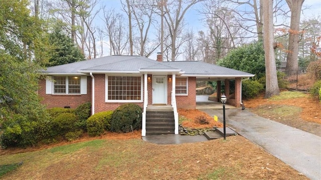 view of front of property with a carport