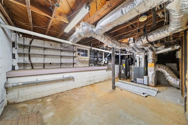 basement with heating unit and water heater